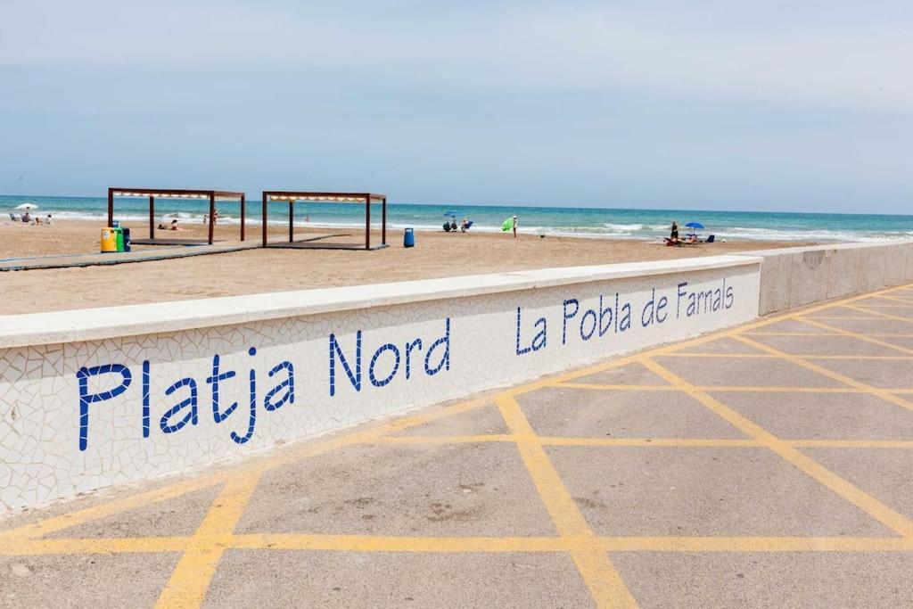 شقة La Llar45 , Relajate Junto Al Mar بلايا بوبلا دي فارنالز المظهر الخارجي الصورة